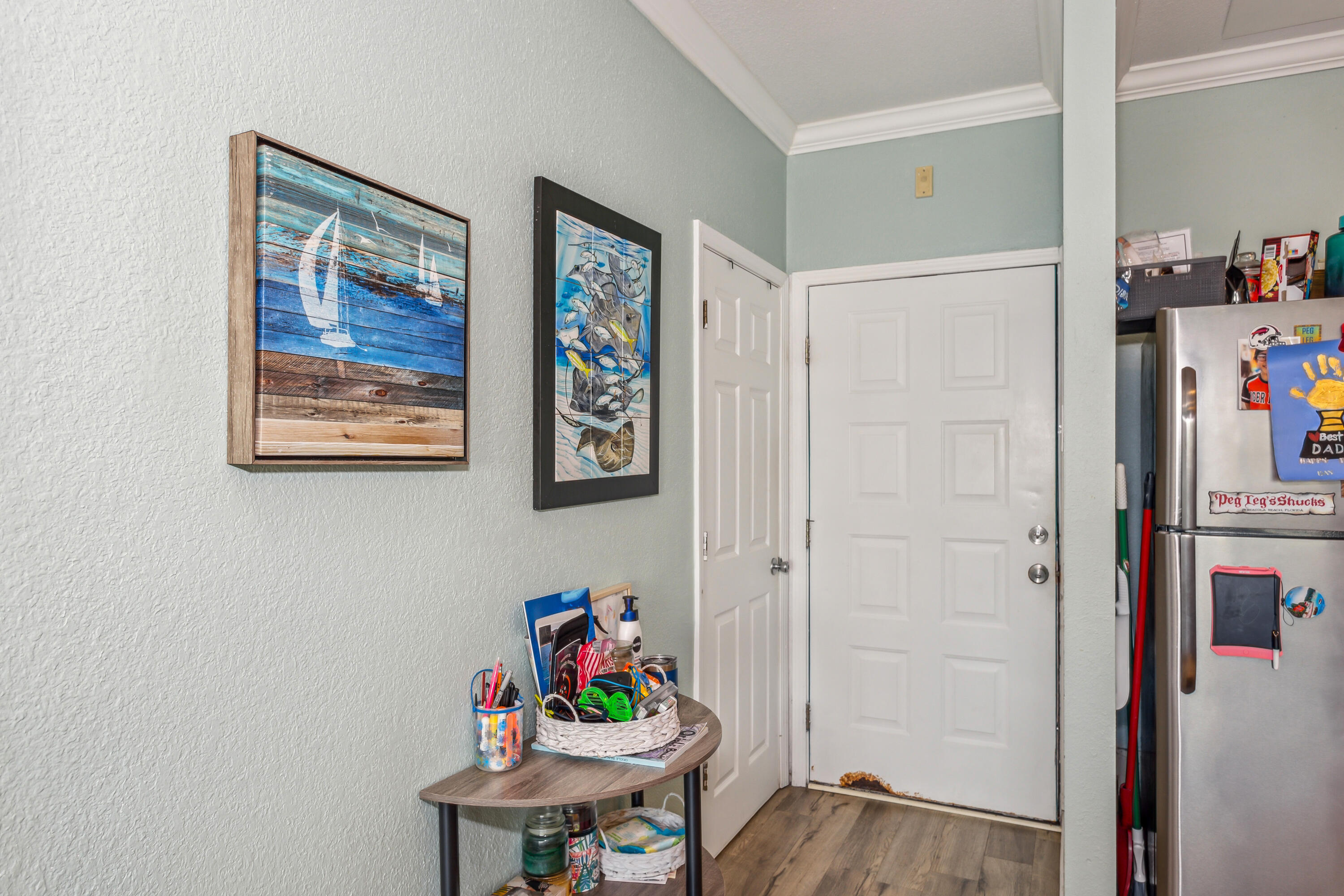 1150 Fort Pickens Road, Unit A6 Pensacola Beach, FL 32561 - Photo 3 of 27 a view of a workspace with furniture and toys