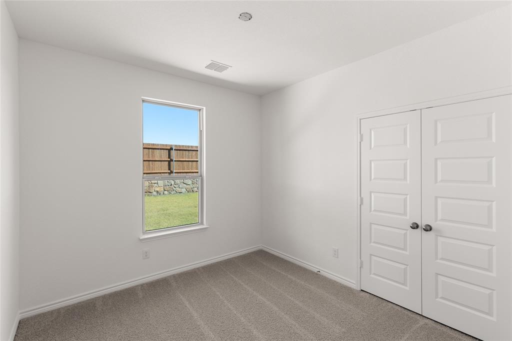 418 Comanche Drive Cleburne, TX 76033 - Photo 27 of 40 418 ComancheBedroom1
