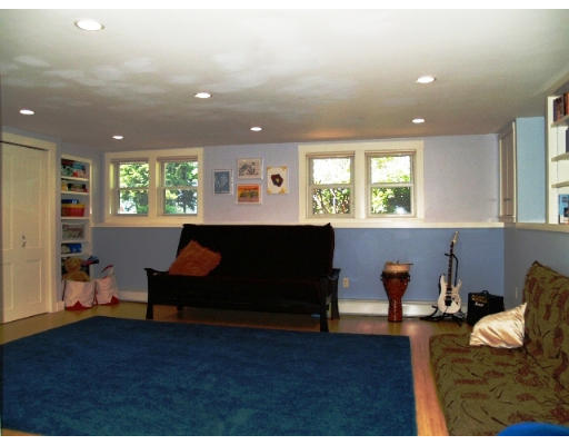 6 Ash Street Lexington, MA 02421 - Photo 17 of 18 a living room with furniture and a wooden floor