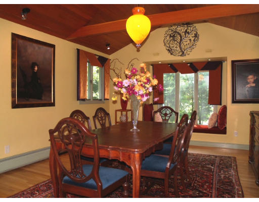 6 Ash Street Lexington, MA 02421 - Photo 5 of 18 a view of a dining room with furniture and wooden floor