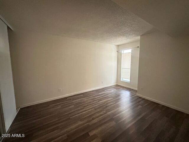 6814 North 35th Avenue, Unit A Phoenix, AZ 85017 - Photo 11 of 13 a view of an empty room and wooden floor