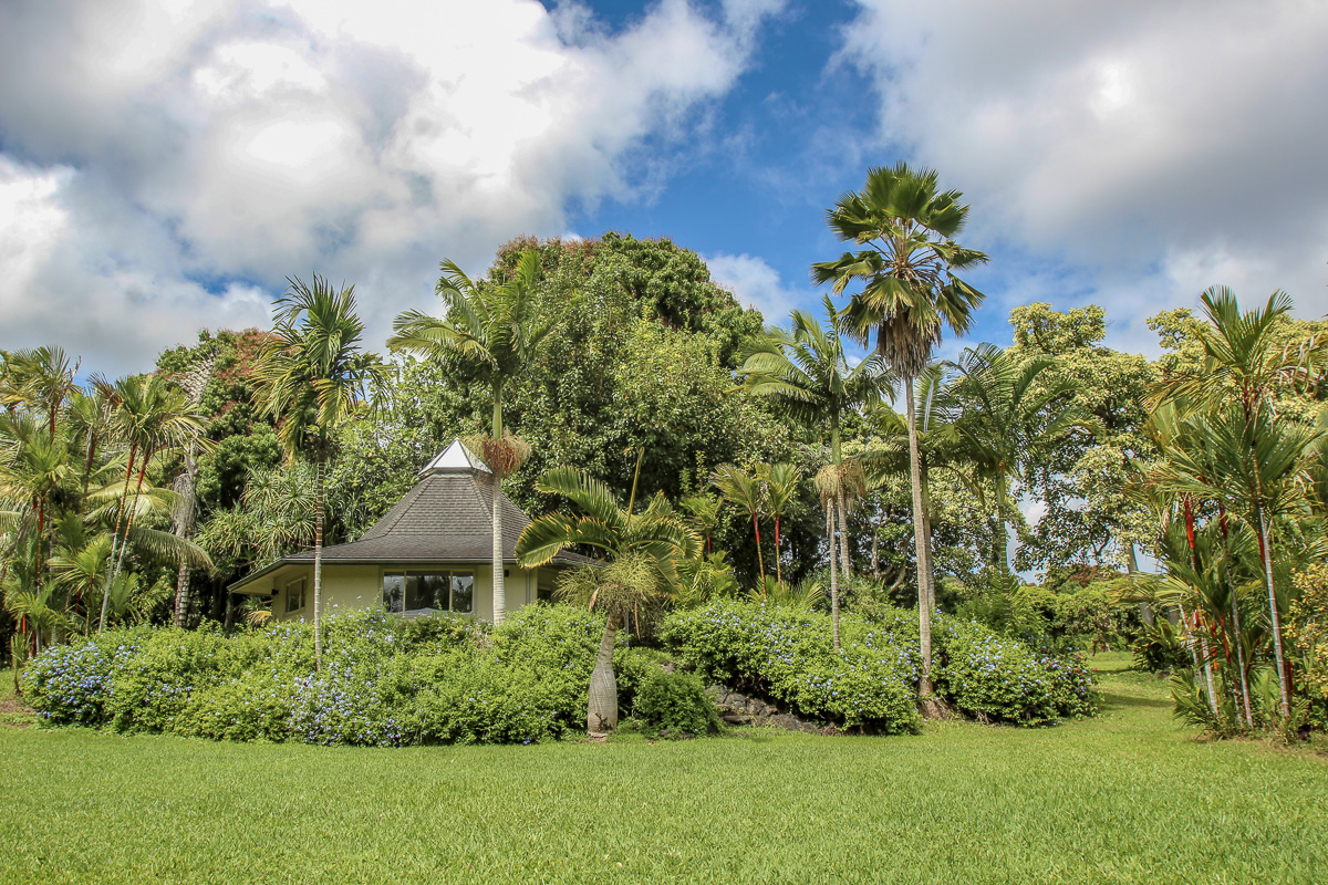 13-178 Kamaili Road Pahoa, HI 96778 - Photo 1 of 30 a front view of a house with a yard