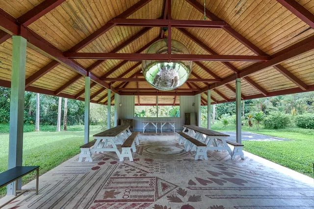 a view of a backyard with a sitting space