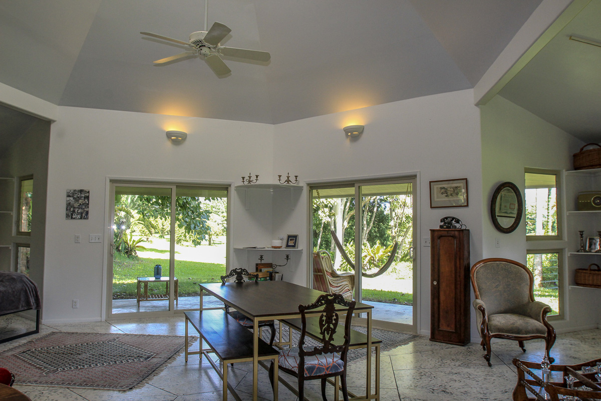 13-178 Kamaili Road Pahoa, HI 96778 - Photo 21 of 30 a dining room with furniture a window and outside view