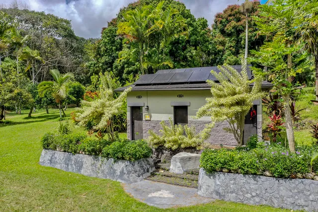 a house view with a garden space