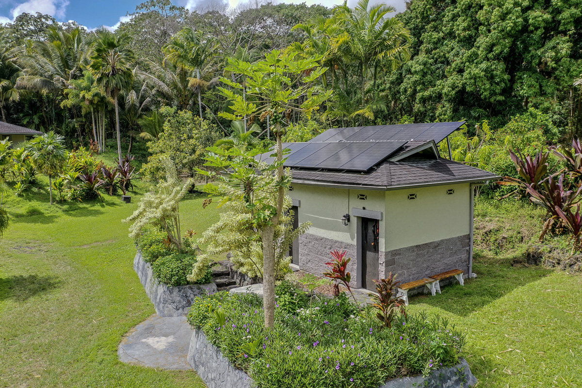 13-178 Kamaili Road Pahoa, HI 96778 - Photo 7 of 30 a view of a house with a yard