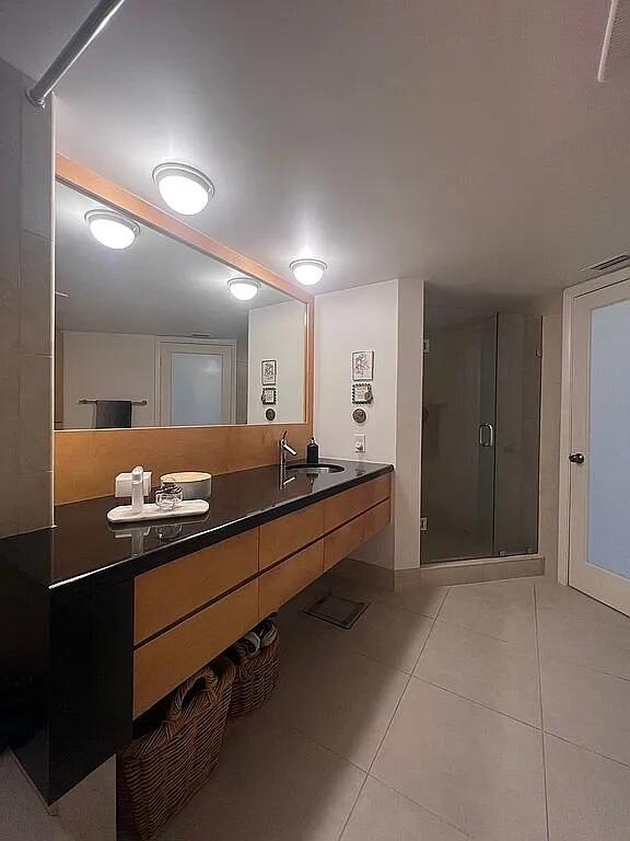 6463 La Costa Drive, Unit 105 Boca Raton, FL 33433 - Photo 24 of 40 a room with stainless steel appliances kitchen island sink and living room view