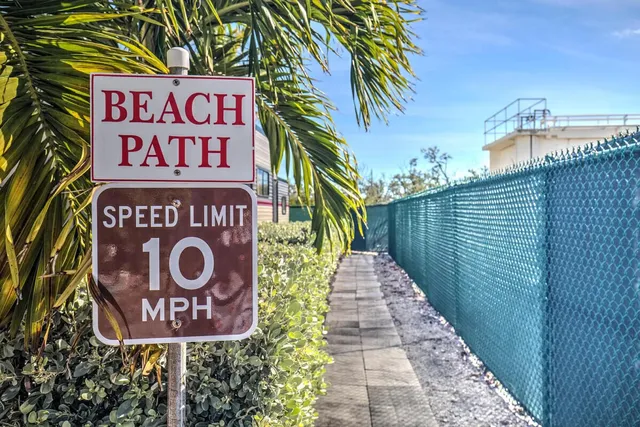 a sign that is on a brick wall