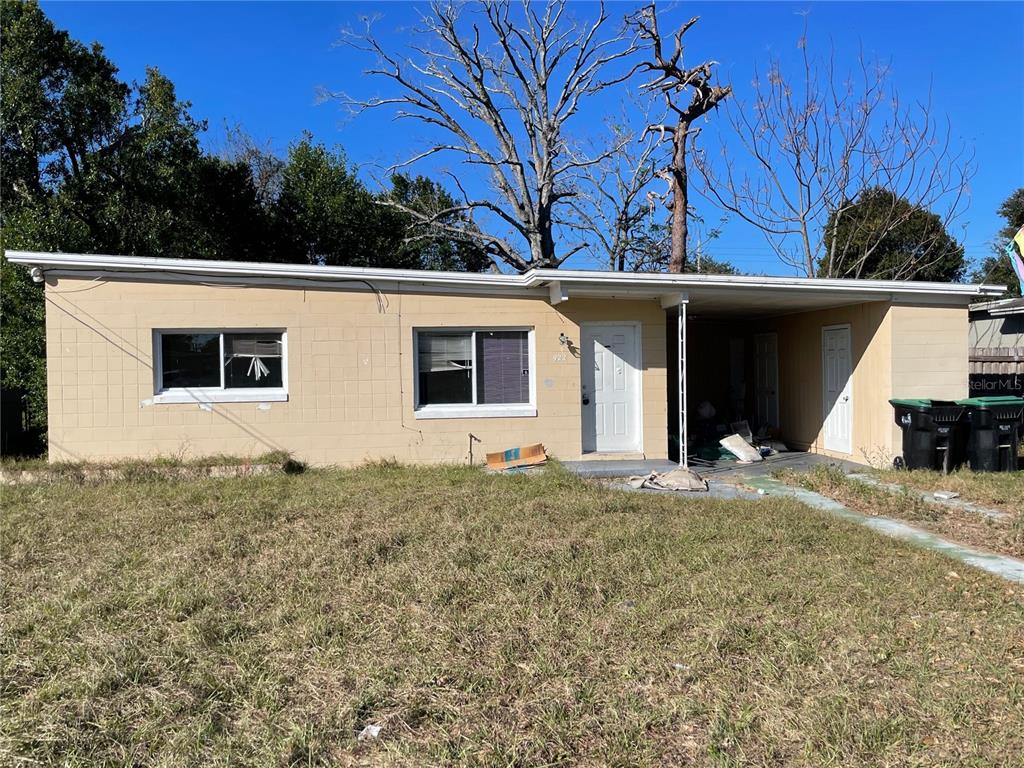 922 Inchon Court Orlando, FL 32808 - Photo 1 of 1 a view of a house with a backyard