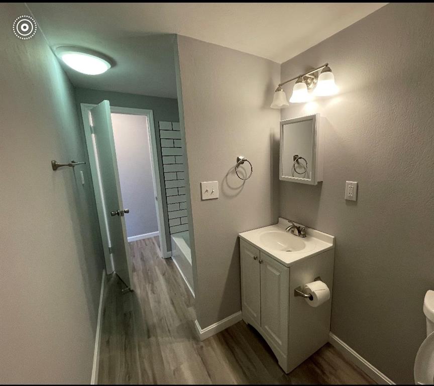 93 Church Road Eighty Four, PA 15330 - Photo 11 of 14 a bathroom with a sink a toilet a mirror and vanity
