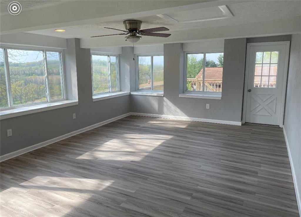 93 Church Road Eighty Four, PA 15330 - Photo 7 of 14 a view of livingroom with hardwood floor and window