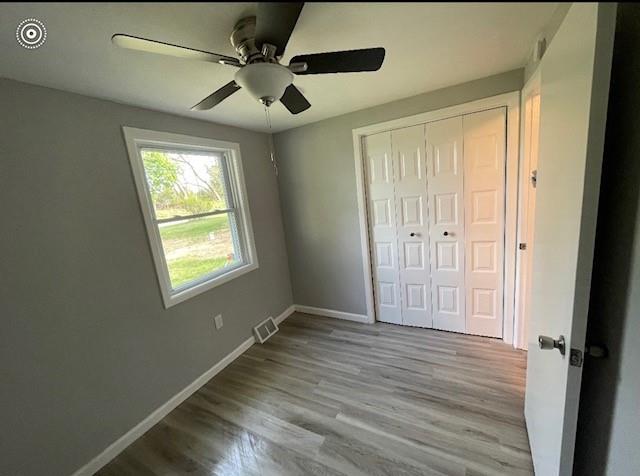 93 Church Road Eighty Four, PA 15330 - Photo 9 of 14 a view of an empty room with wooden floor and a window
