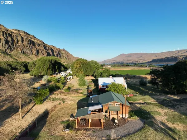 a view of a house with a ocean view