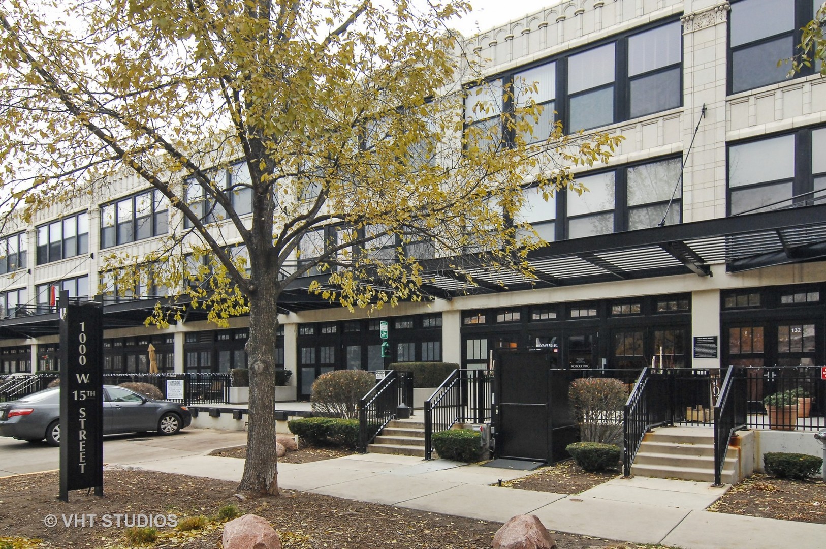 1000 West 15th Street, Unit 235 Chicago, IL 60608 - Photo 1 of 16 a front view of a building with street view