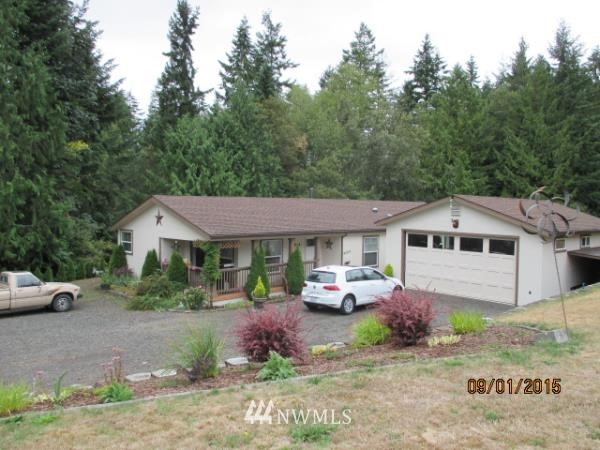 175 Port Hadlock Heights Road Port Hadlock, WA 98339 - Photo 1 of 1 a front view of a house with garden