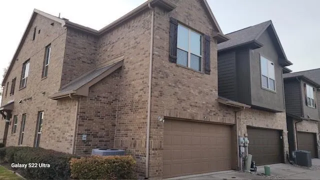 a brick building with a large windows