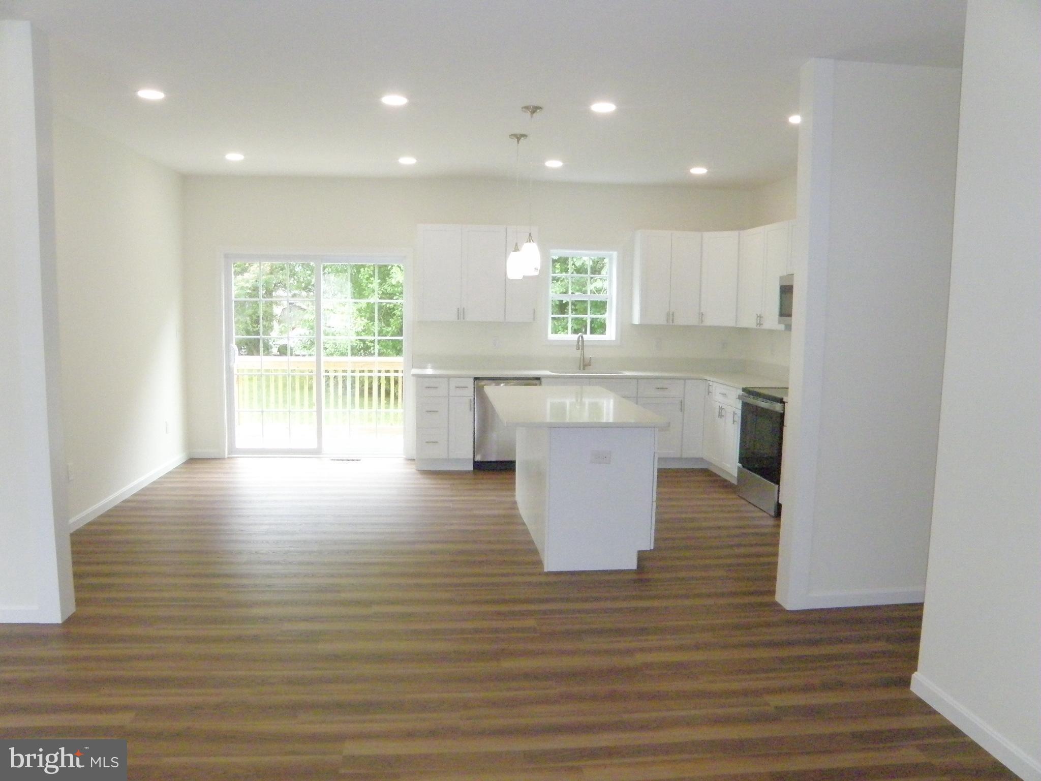 3 Alfred Street Georgetown, DE 19947 - Photo 2 of 18 View of Kitchen & Island from the Front Door