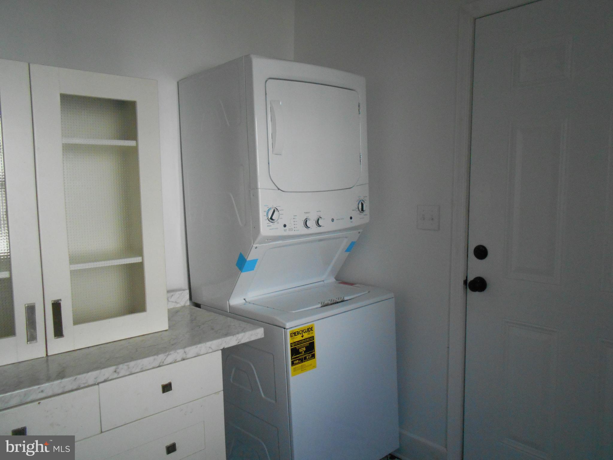 913 Central Avenue Cambridge, MD 21613 - Photo 7 of 20 Laundry room w/stackable laundry center