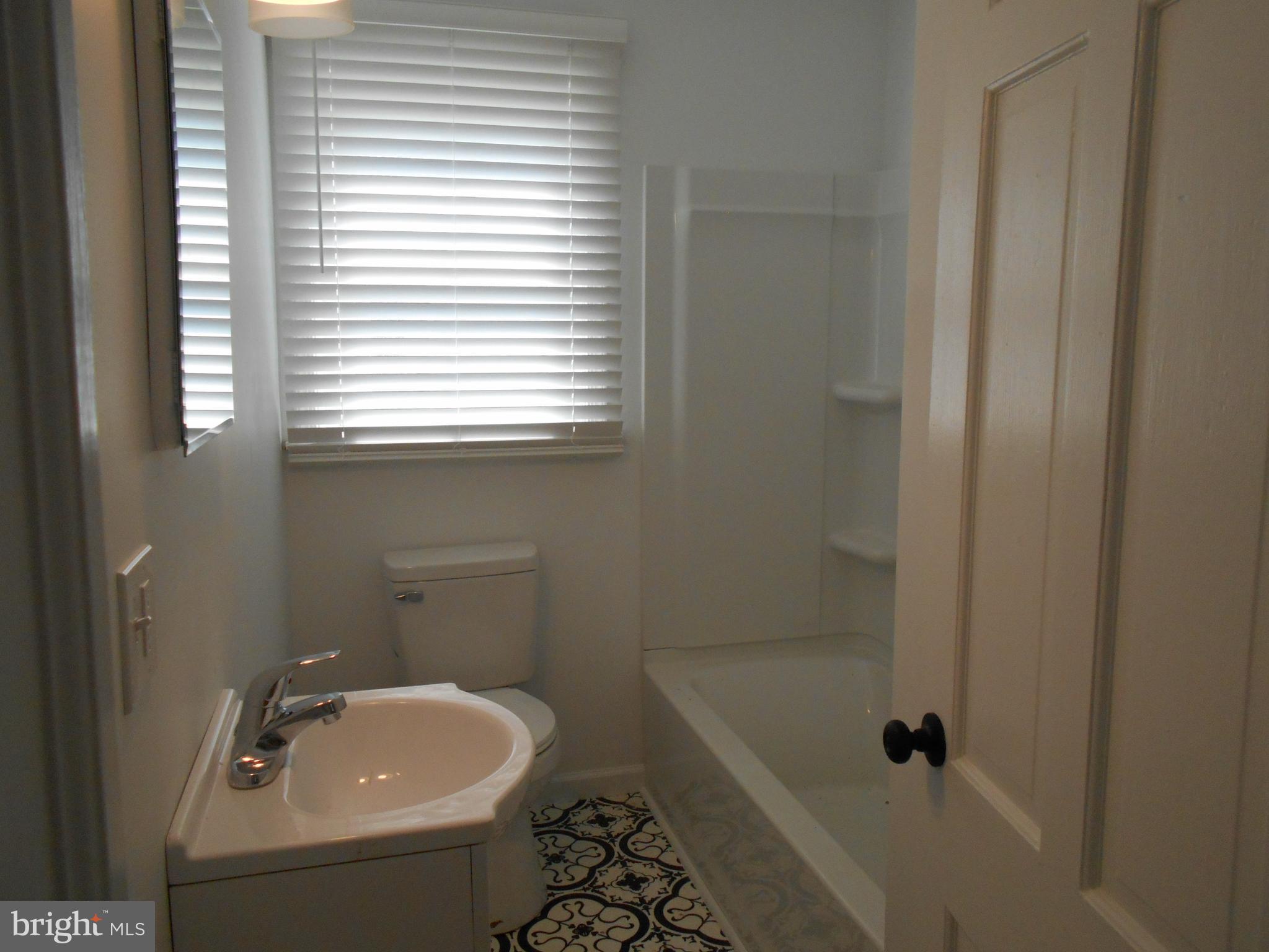 913 Central Avenue Cambridge, MD 21613 - Photo 8 of 20 Updated bath w/new vanity