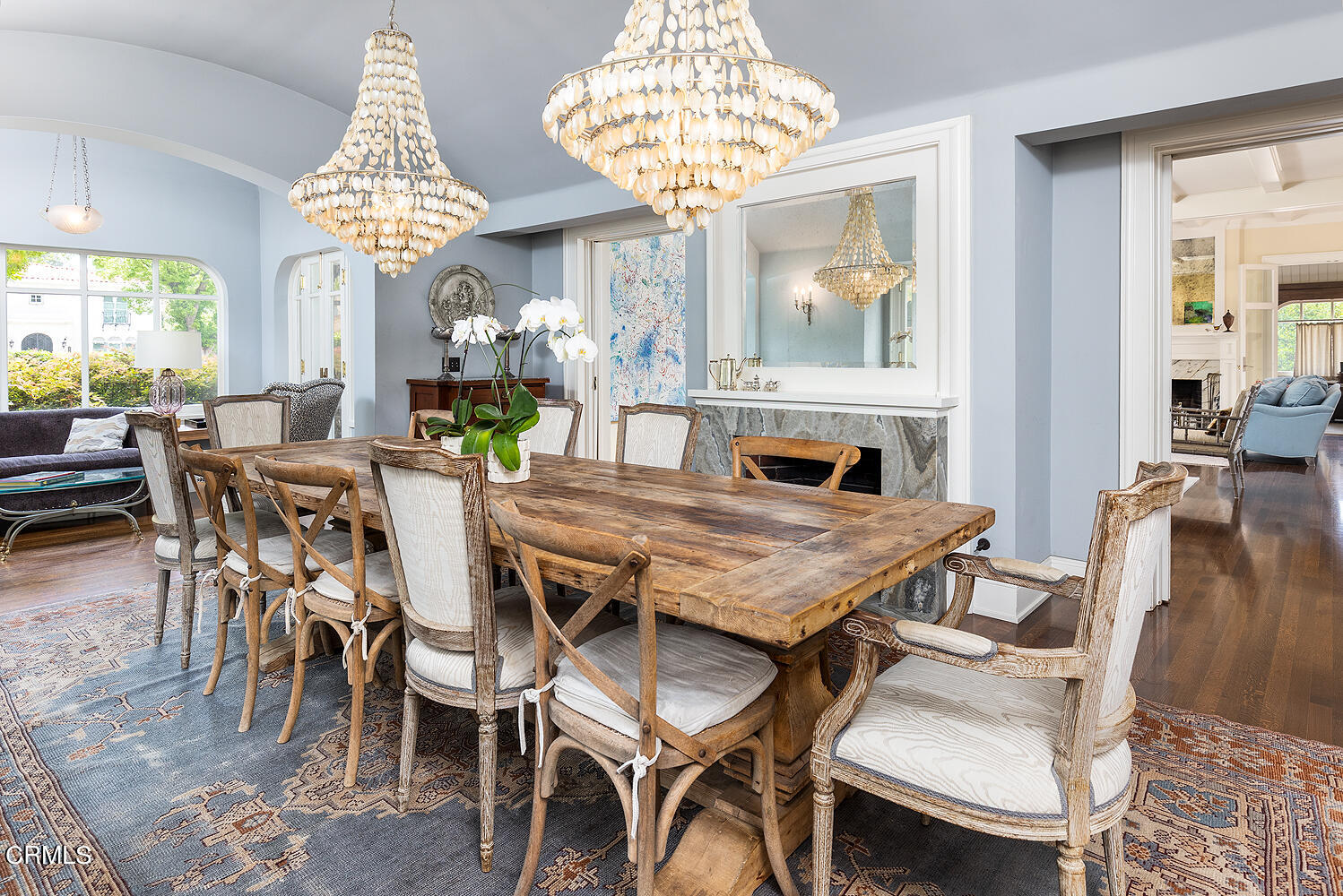 1375 Ridge Way Pasadena, CA 91106 - Photo 11 of 36 a dining room with furniture a chandelier and wooden floor