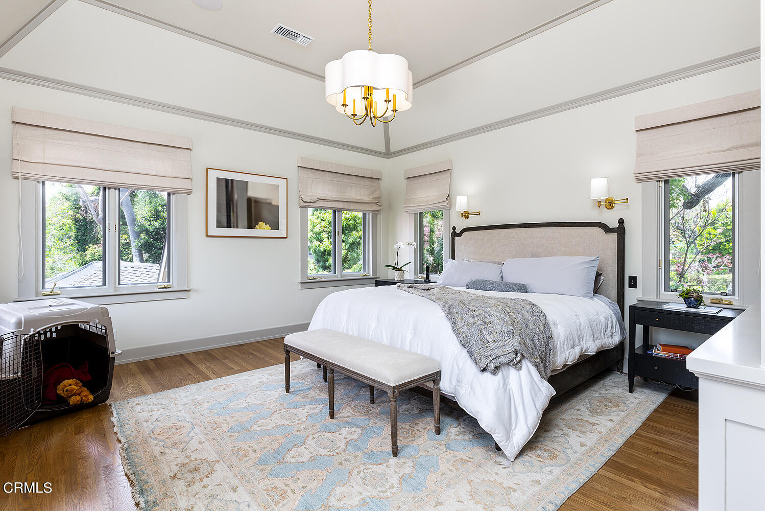1375 Ridge Way Pasadena, CA 91106 - Photo 22 of 36 a bedroom with a bed and a chandelier