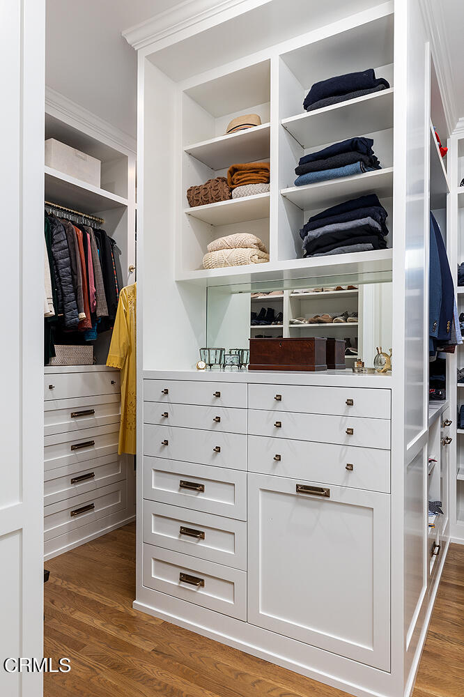 1375 Ridge Way Pasadena, CA 91106 - Photo 24 of 36 a view of walk in closet with clothes and shoes