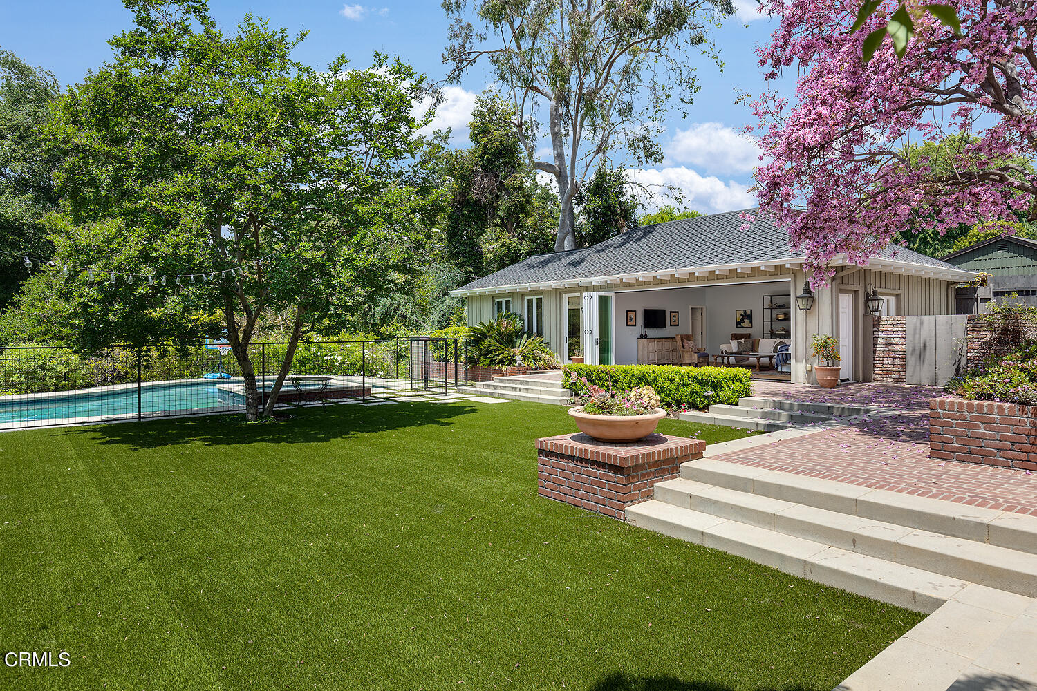 1375 Ridge Way Pasadena, CA 91106 - Photo 26 of 36 a front view of a house with garden and trees