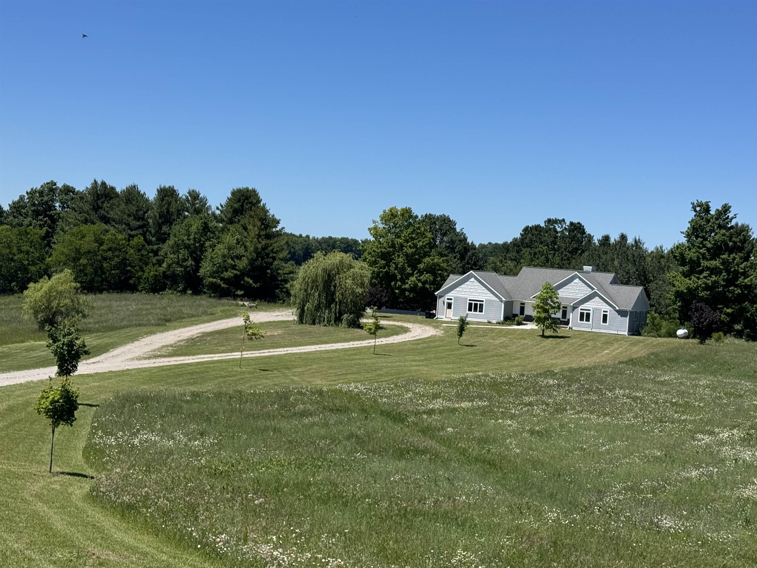 8255 Angell Road Williamsburg, MI 49690 - Photo 2 of 17 1947611-6e76d876-b6f5-4341-91a4-e237a2ccbec1.JPG