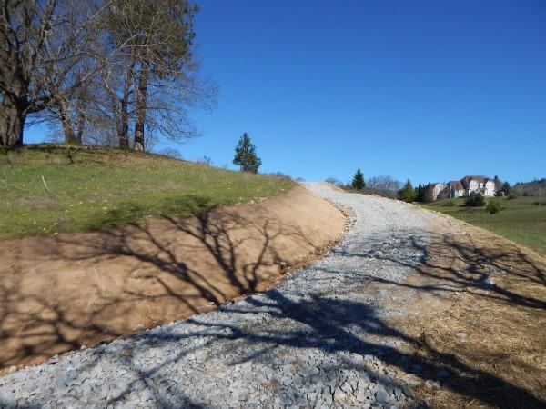 3314 Upper River Road Grants Pass, OR 97526 - Photo 18 of 22 a view of a road with a yard