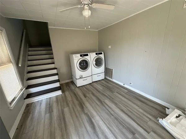 a utility room with dryer and washer