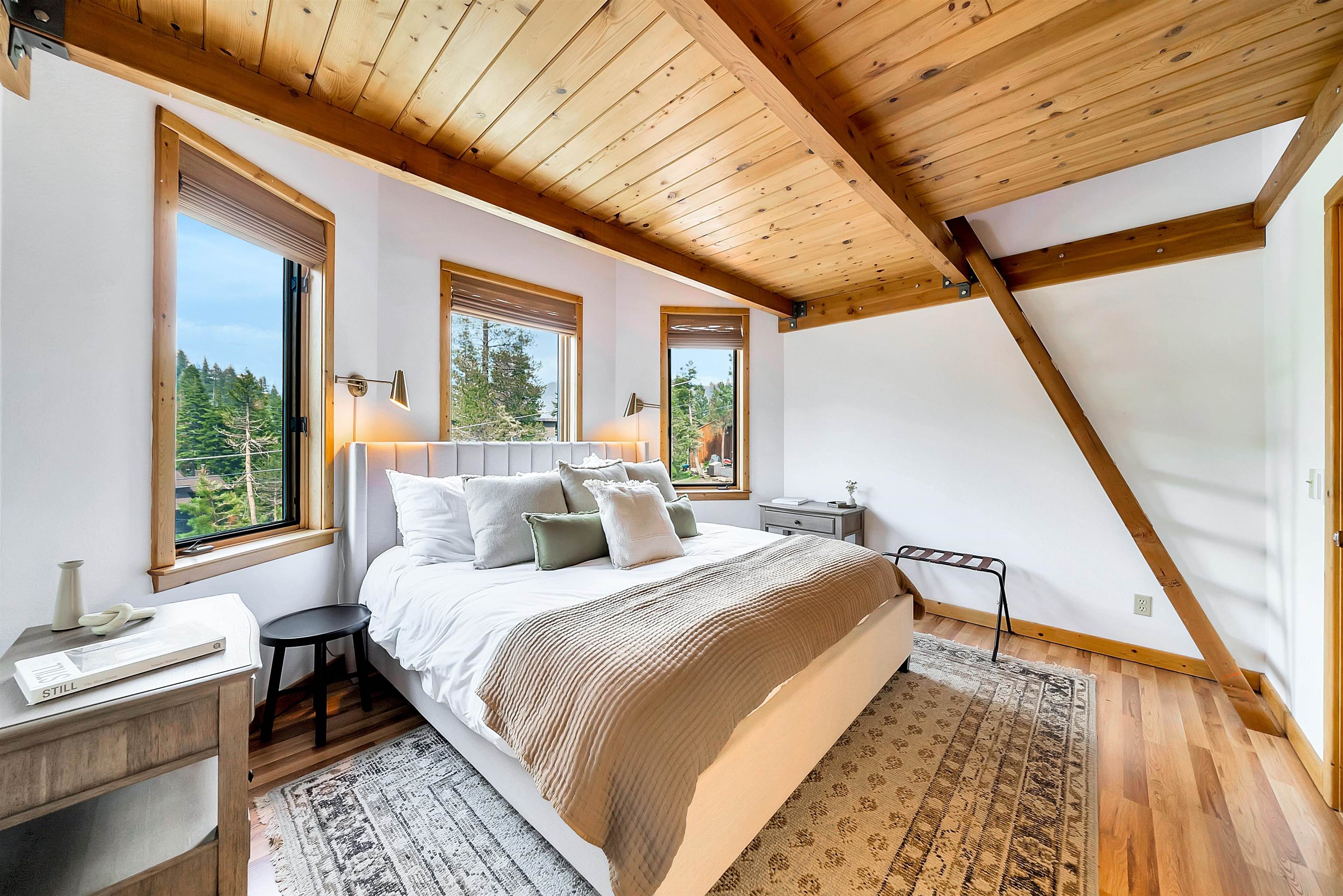 1191 Snow Crest Road Alpine Meadows, CA 96146 - Photo 17 of 28 a bed sitting in a bedroom next to a window