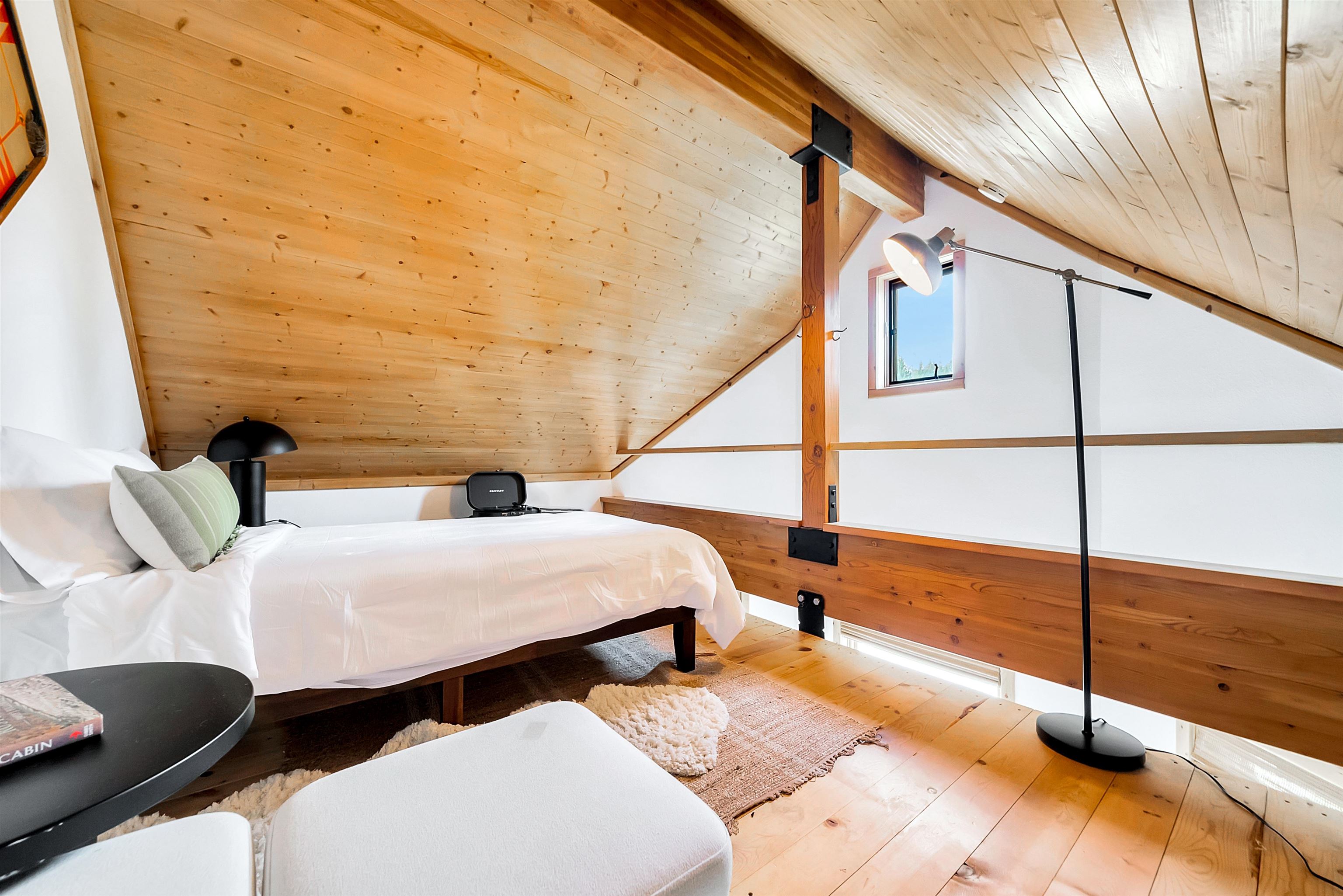 1191 Snow Crest Road Alpine Meadows, CA 96146 - Photo 20 of 28 a bedroom with double bed and a large window