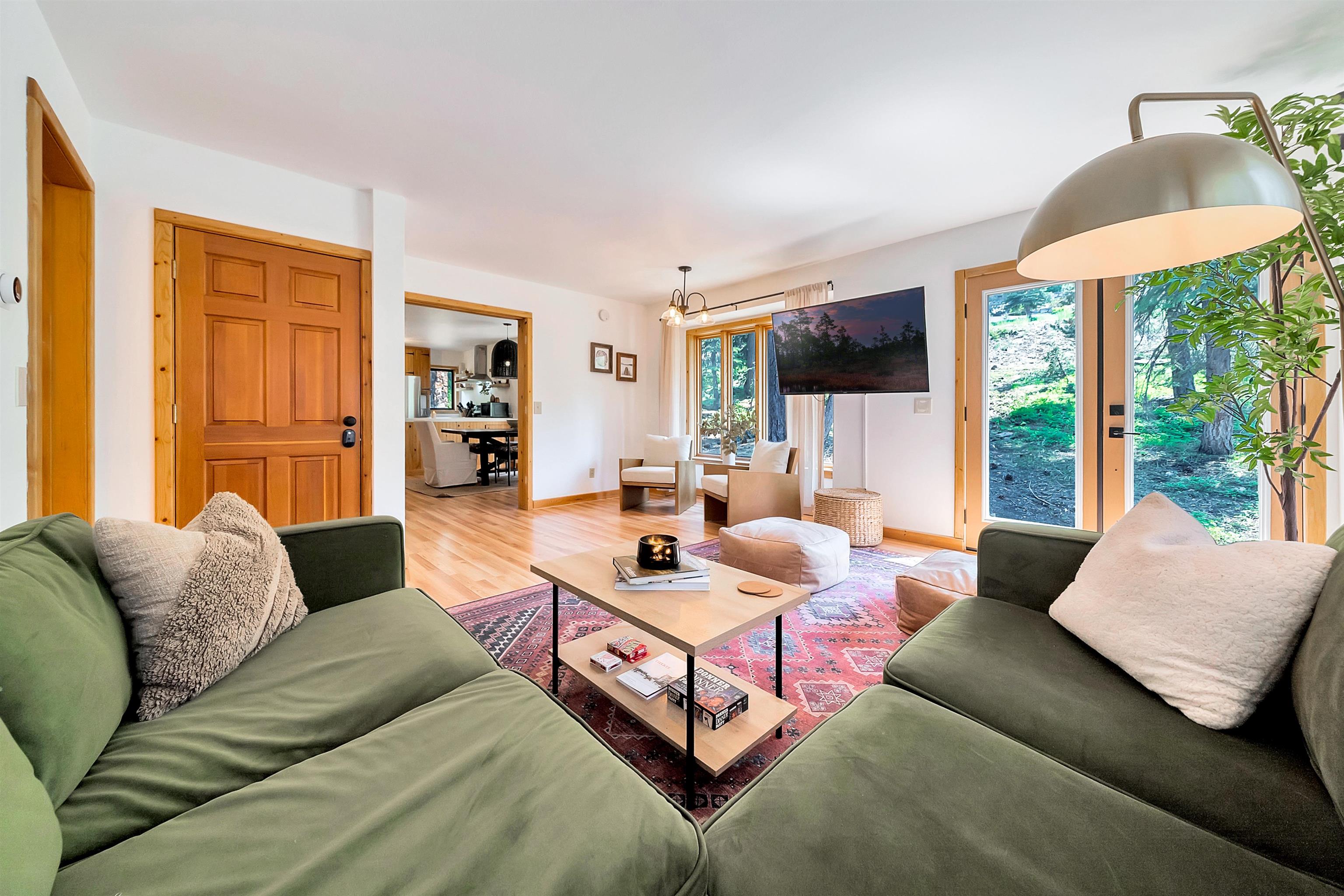 1191 Snow Crest Road Alpine Meadows, CA 96146 - Photo 5 of 28 a living room with furniture and a flat screen tv
