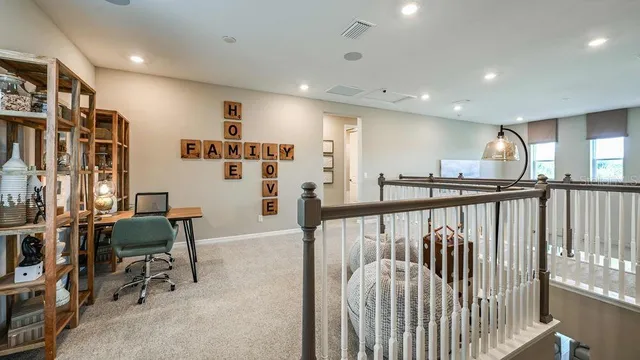 a bathroom with a toilet sink vanity and mirror