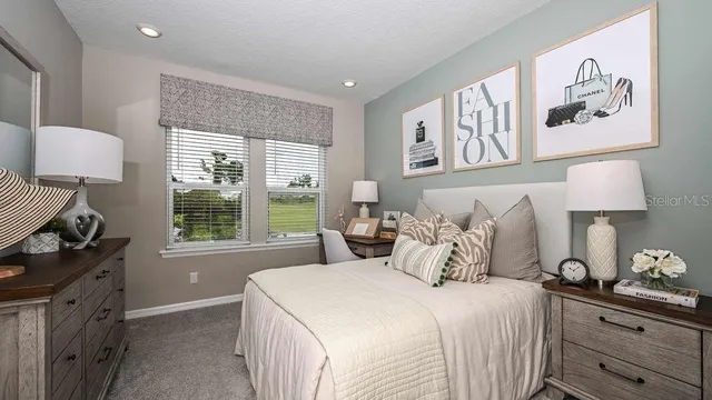 a view of swimming pool with outdoor seating