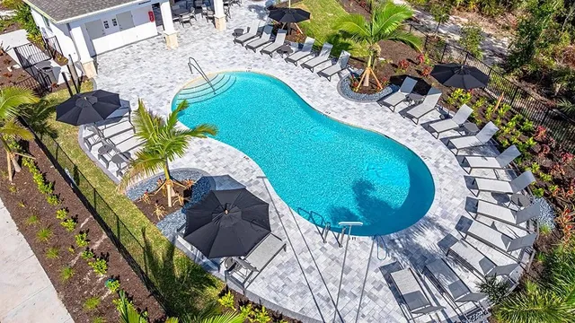 a view of a backyard with sitting area