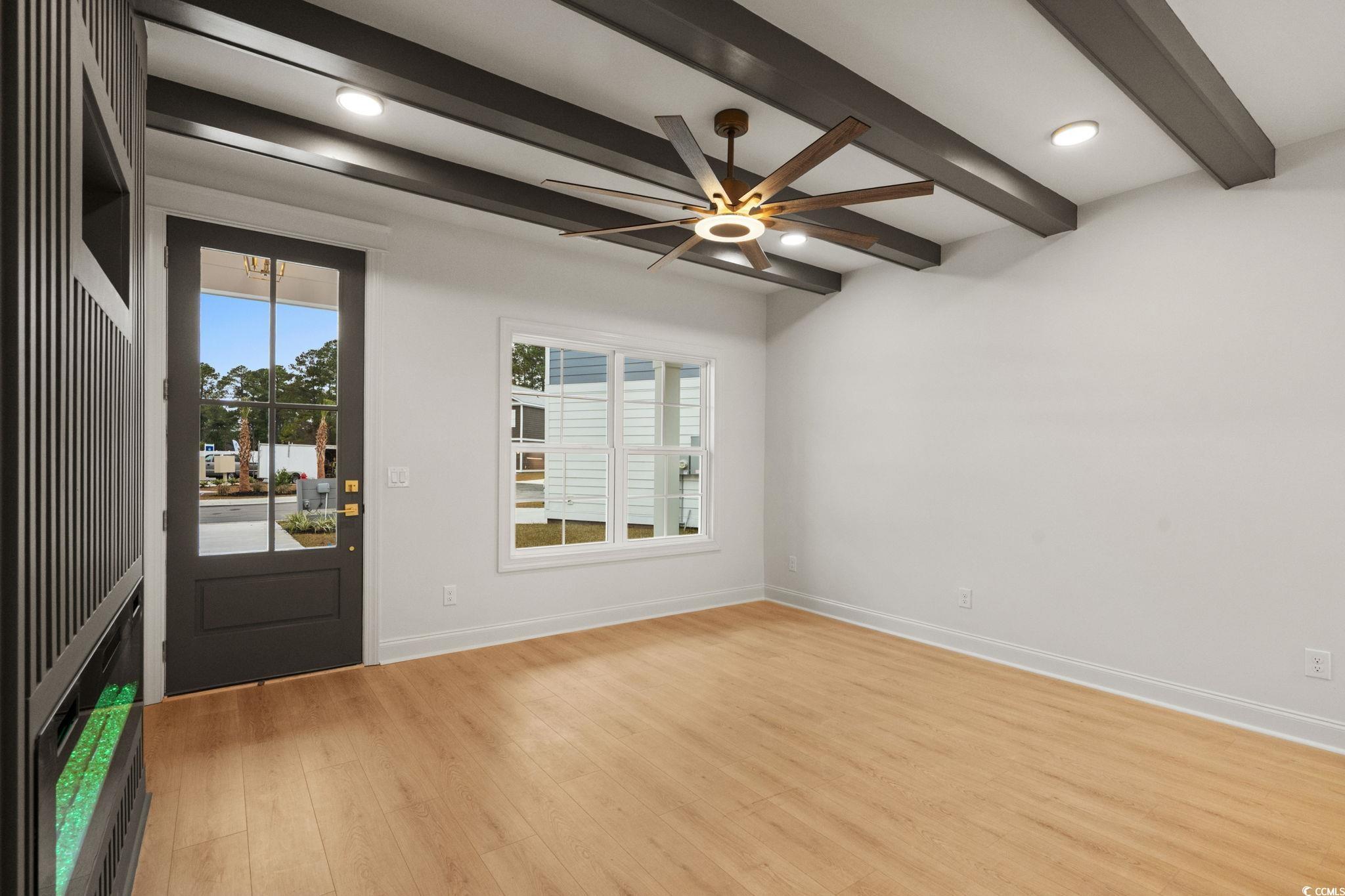 144 Arbor Ridge Circle Conway, SC 29526 - Photo 4 of 40 Entryway featuring healthy amount of natural light, ceiling fan, light wood-type flooring, and beam ceiling