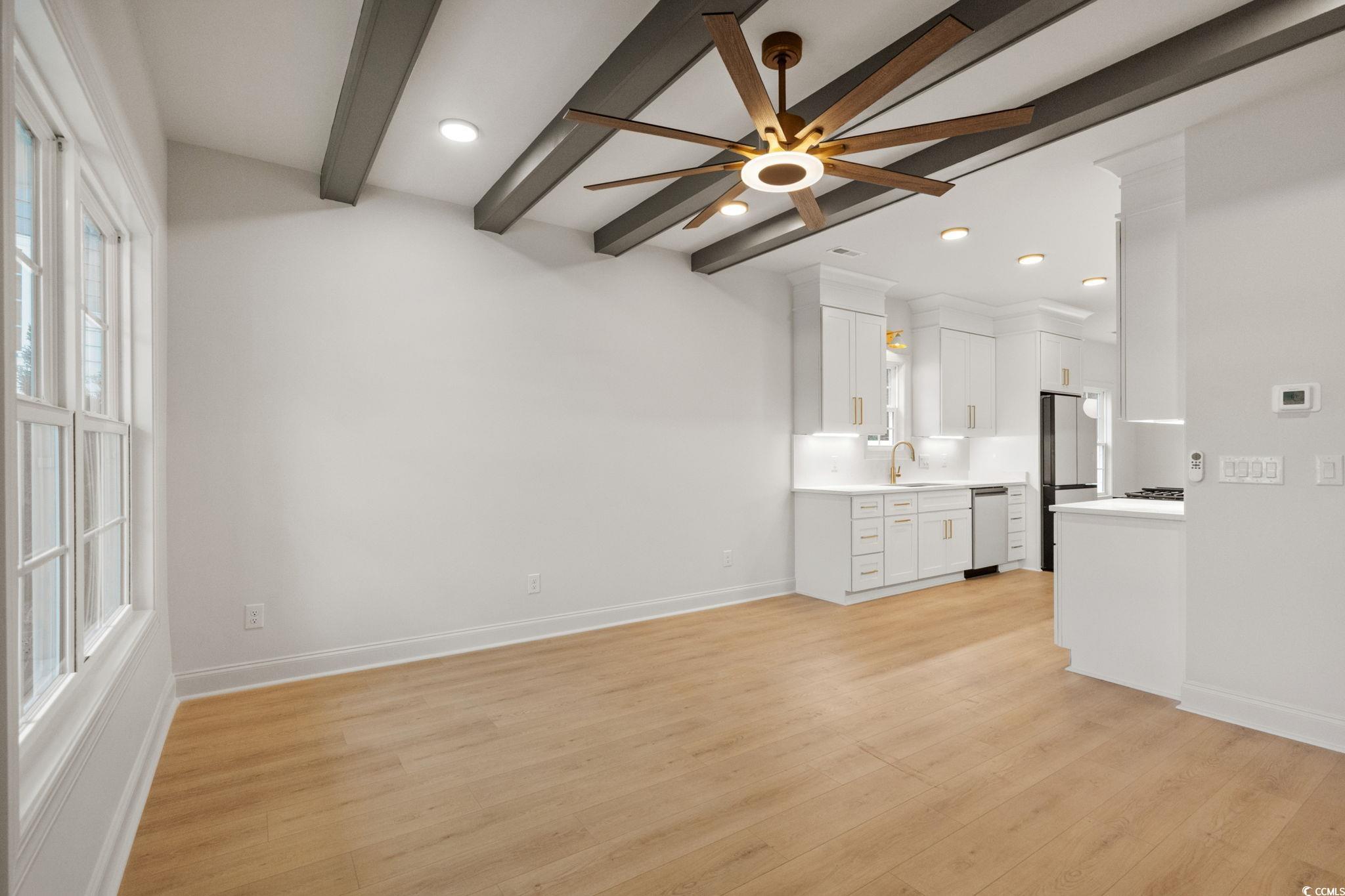 144 Arbor Ridge Circle Conway, SC 29526 - Photo 7 of 40 Unfurnished living room featuring recessed lighting, light wood-style floors, beam ceiling, and ceiling fan
