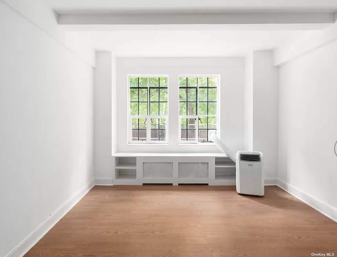 a living room with furniture and window