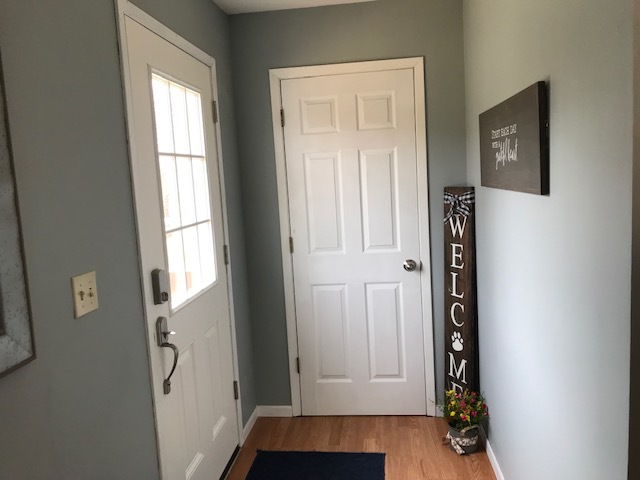 14475 Waller Road Albany, IL 61230 - Photo 2 of 22 a view of entryway with wooden floor
