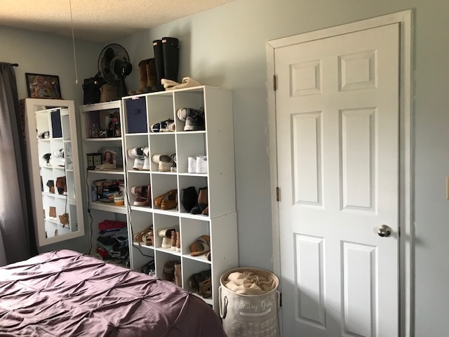 14475 Waller Road Albany, IL 61230 - Photo 14 of 22 a bed room with a bed and closet