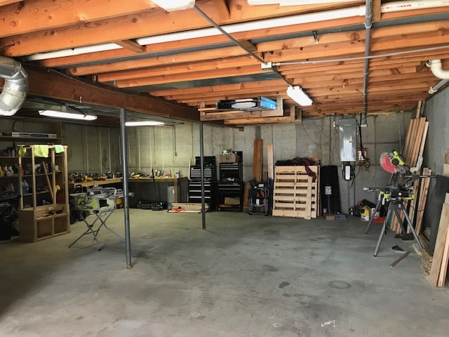 14475 Waller Road Albany, IL 61230 - Photo 16 of 22 a view of a storage room with a lot of stuff
