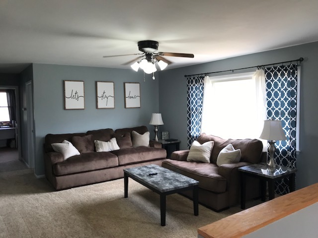 14475 Waller Road Albany, IL 61230 - Photo 7 of 22 a living room with furniture and a large window