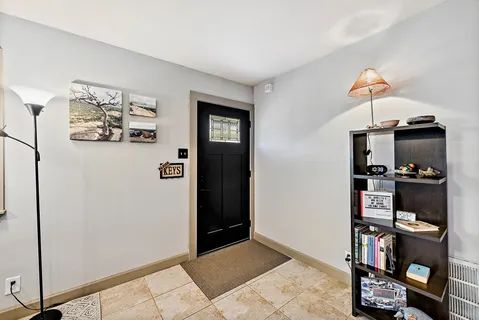 a view of a hallway with shelves
