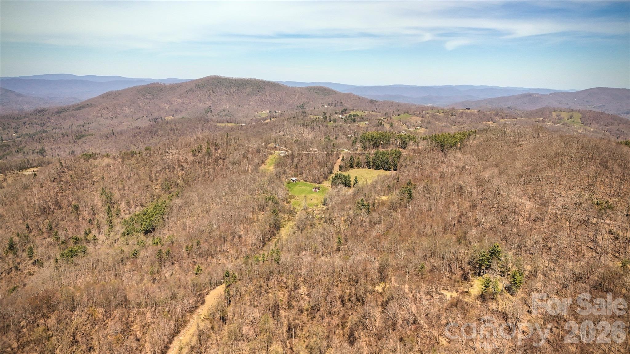 7277 Beech Mountain Road Elk Park, NC 28622 - Photo 9 of 12 a view of a town with mountains in the background