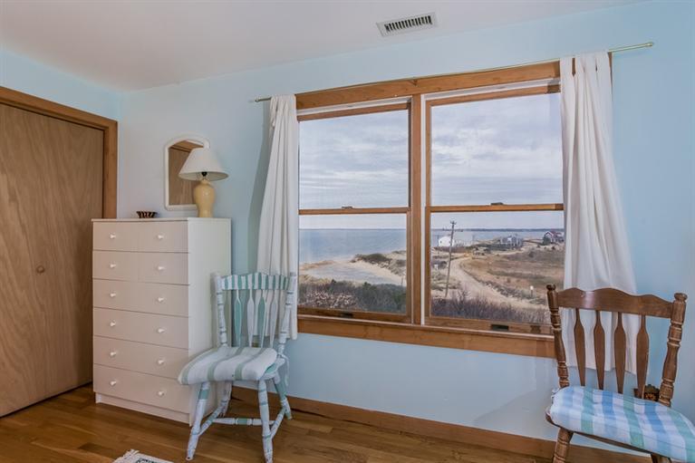 230 Salt Works Road Eastham, MA 02642 - Photo 23 of 35 a view of a room with furniture and wooden floor