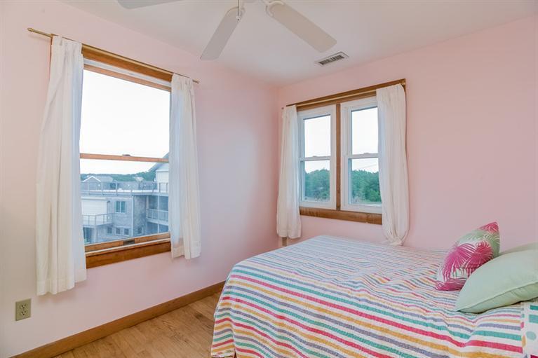 230 Salt Works Road Eastham, MA 02642 - Photo 25 of 35 a bedroom with a bed and window