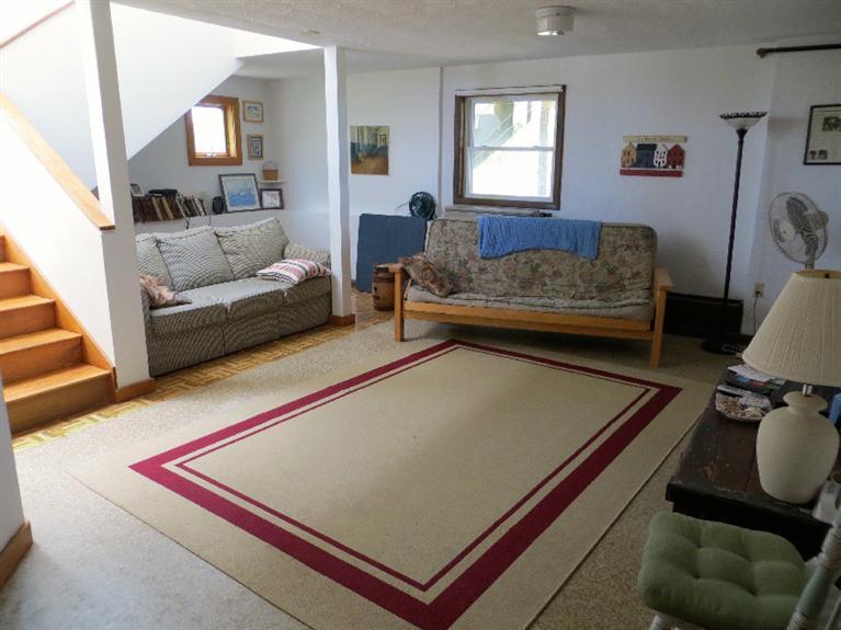 230 Salt Works Road Eastham, MA 02642 - Photo 29 of 35 a living room with furniture and a couch