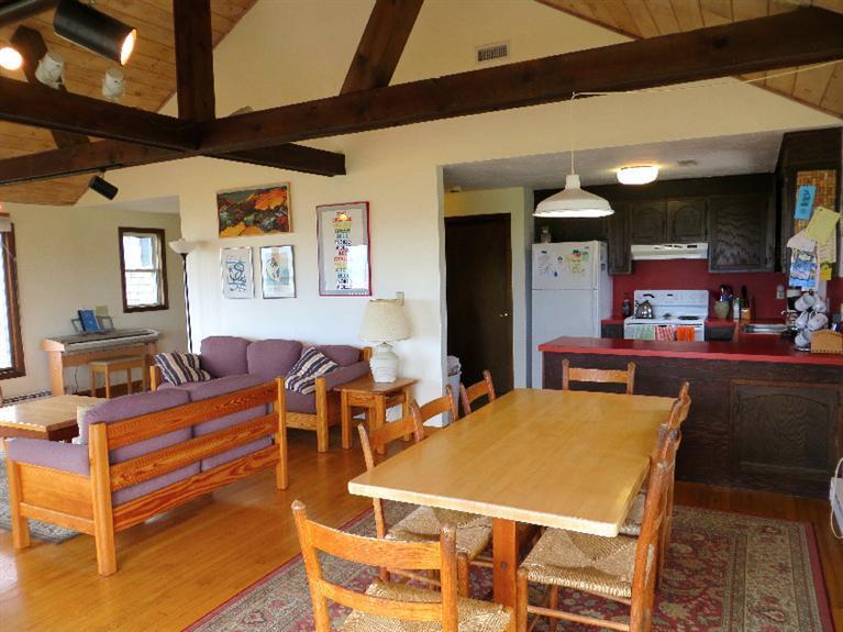 230 Salt Works Road Eastham, MA 02642 - Photo 9 of 35 a view of a dining room with furniture