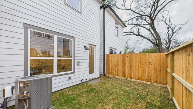 a bedroom with a large bed and a table